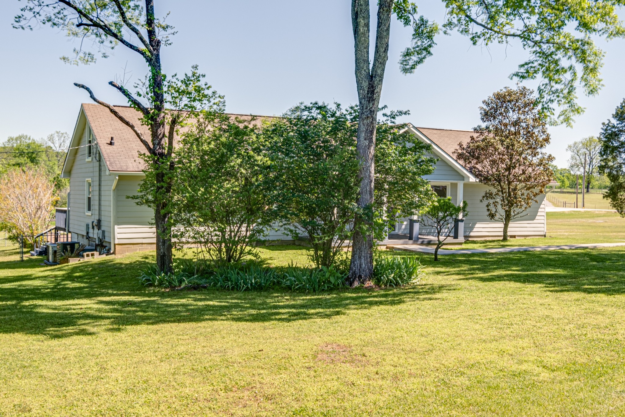 1349 Old Lebanon Dirt Road Mount Juliet, TN 37122 - Photo 2 of 38 a view of a house with swimming pool and a garden