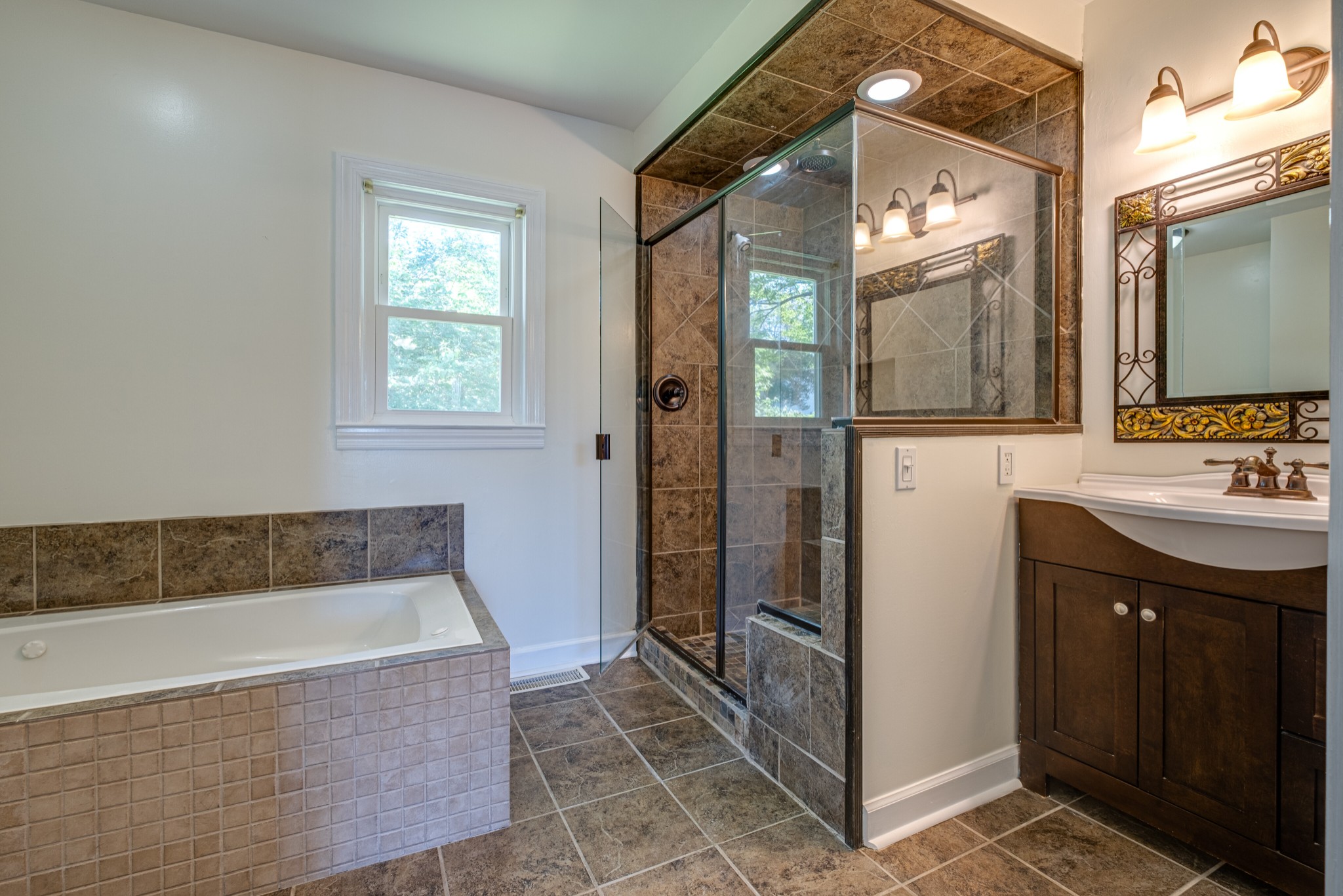 1349 Old Lebanon Dirt Road Mount Juliet, TN 37122 - Photo 24 of 38 a bathroom with a tub sink and mirror
