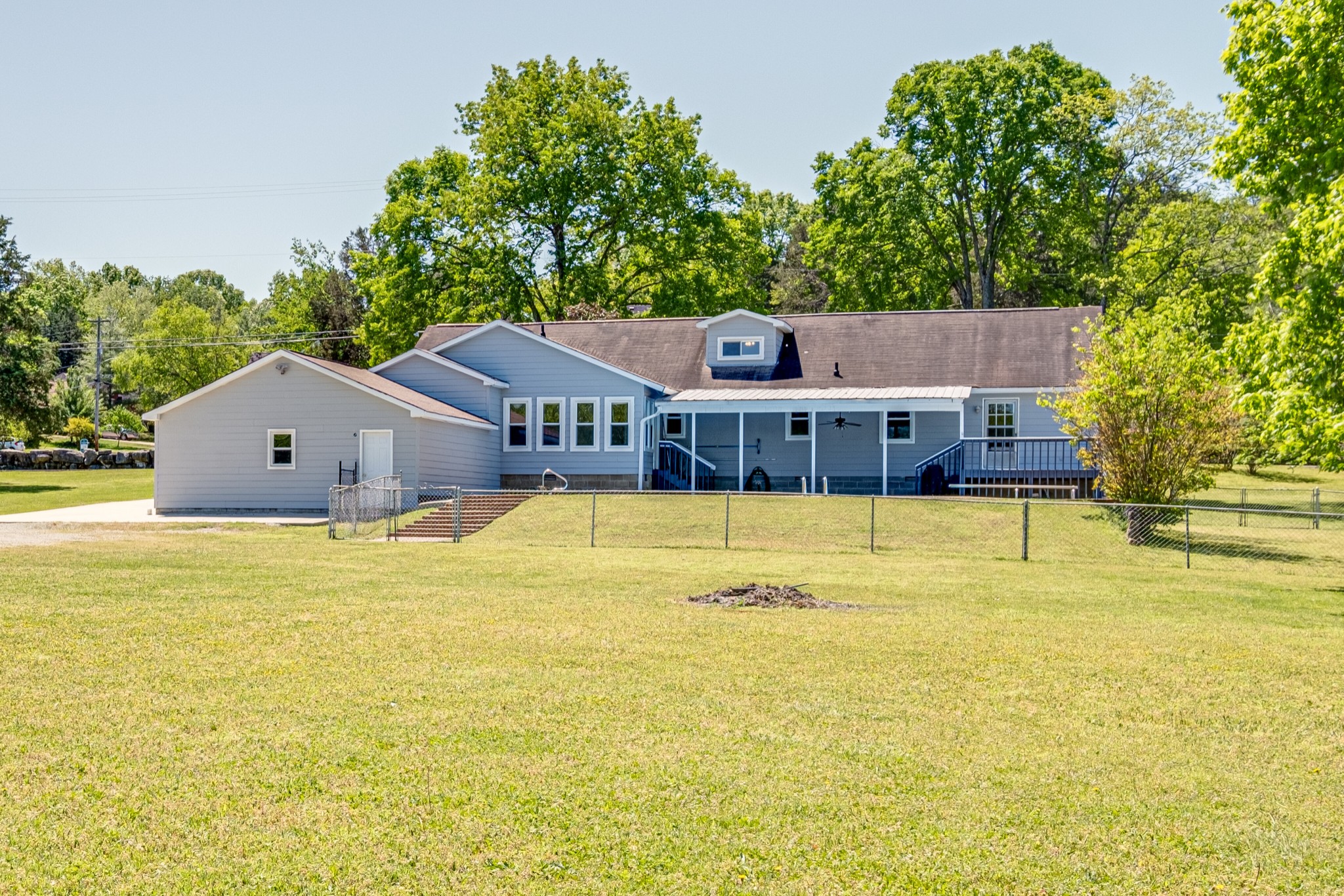 1349 Old Lebanon Dirt Road Mount Juliet, TN 37122 - Photo 38 of 38 a house view with swimming pool in front of it