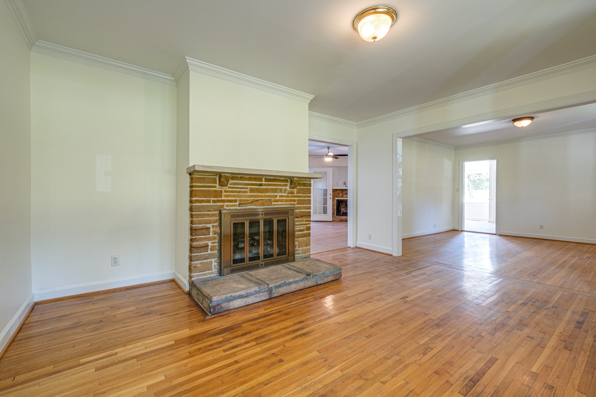1349 Old Lebanon Dirt Road Mount Juliet, TN 37122 - Photo 8 of 38 a view of a livingroom with wooden floor and a fireplace