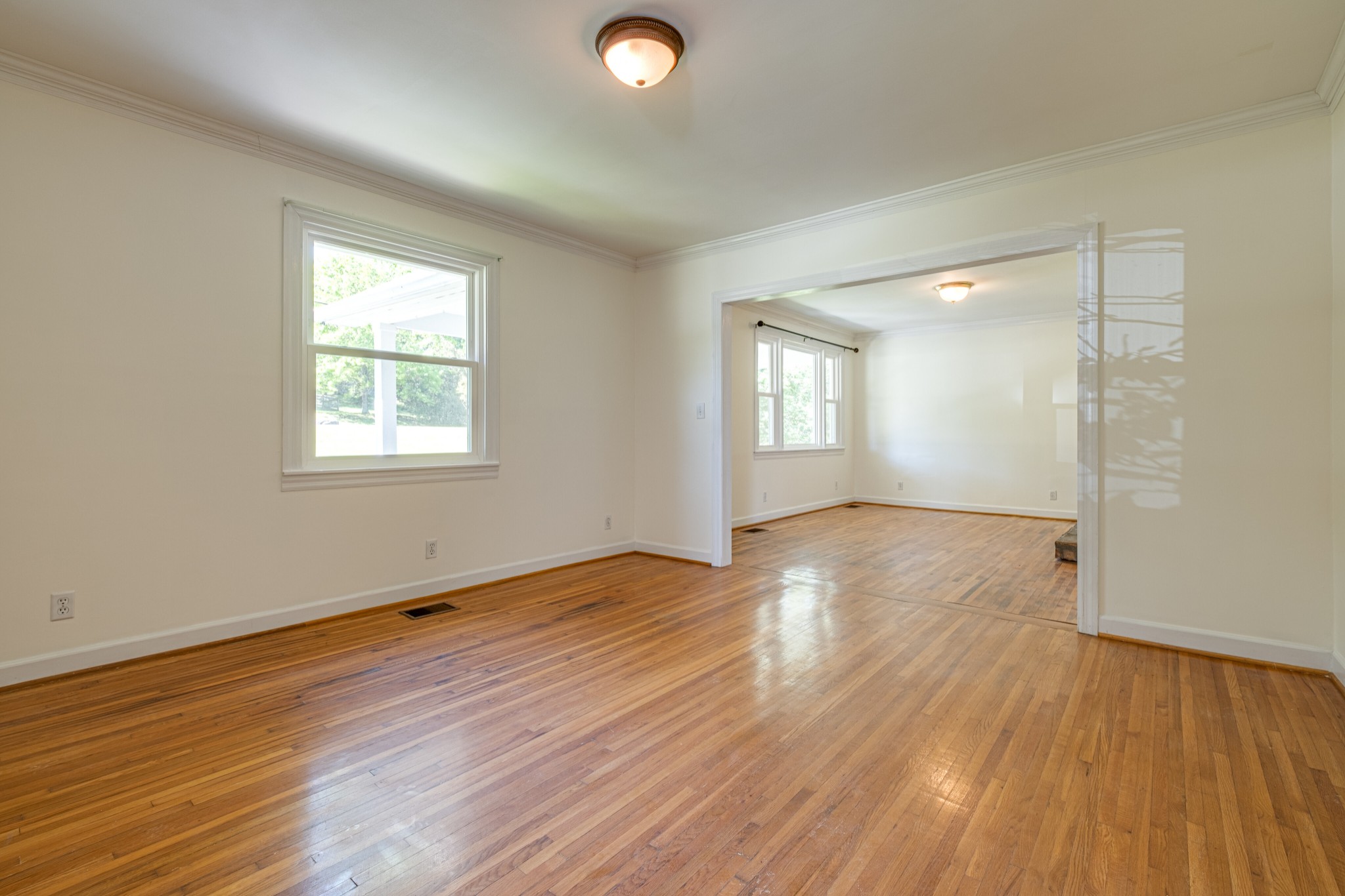 1349 Old Lebanon Dirt Road Mount Juliet, TN 37122 - Photo 9 of 38 an empty room with wooden floor and windows