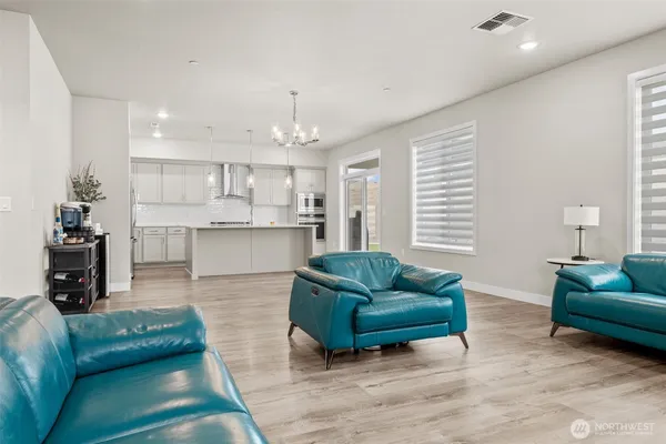 a living room with furniture and a couch