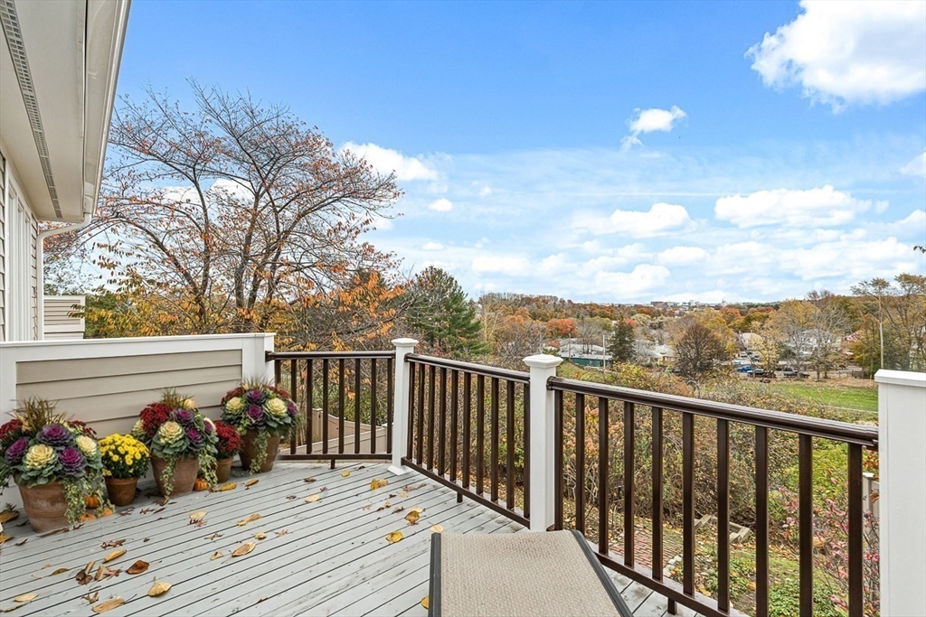 67 Algonquin Road, Unit 67 Newton, MA 02467 - Photo 13 of 38 a view of a wooden roof deck