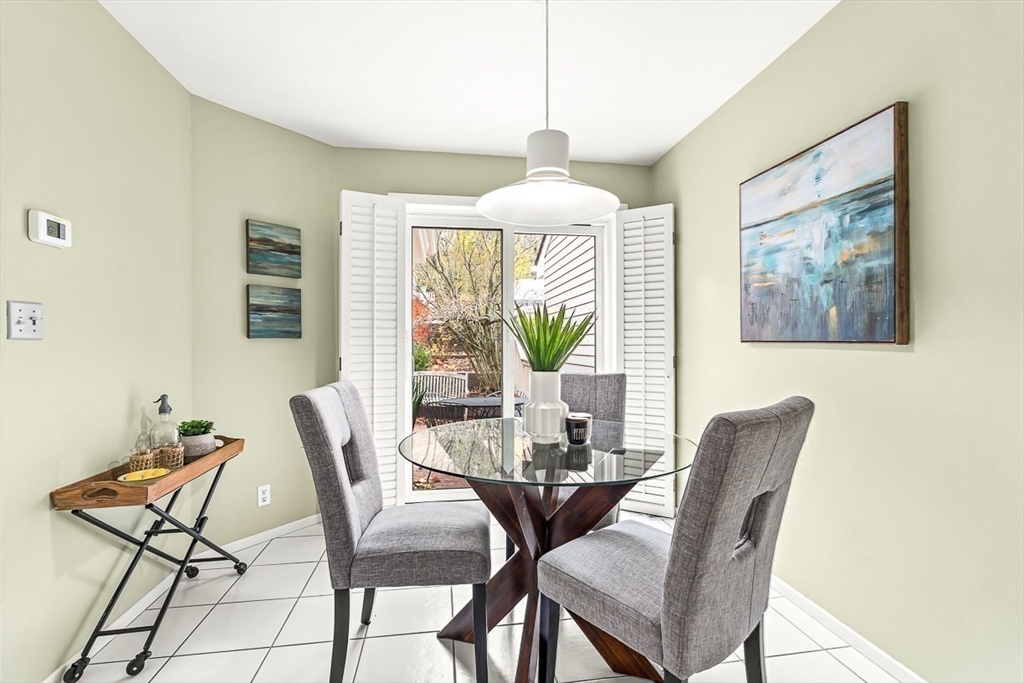 67 Algonquin Road, Unit 67 Newton, MA 02467 - Photo 17 of 38 a dining room with furniture and window