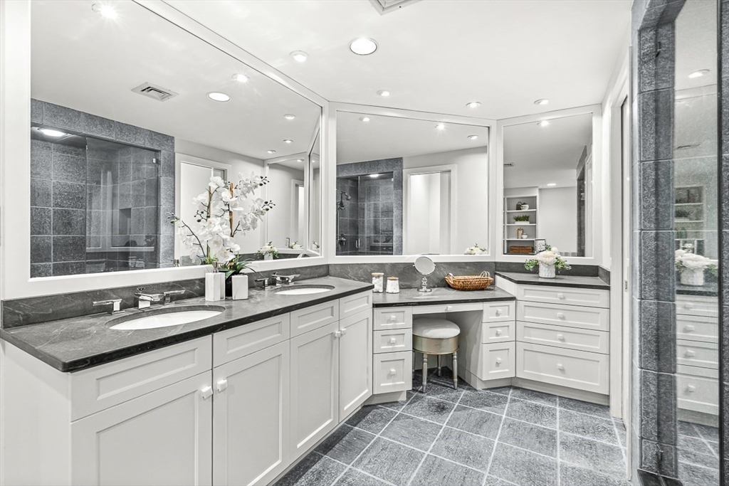 67 Algonquin Road, Unit 67 Newton, MA 02467 - Photo 26 of 38 a kitchen with a sink stove and cabinets