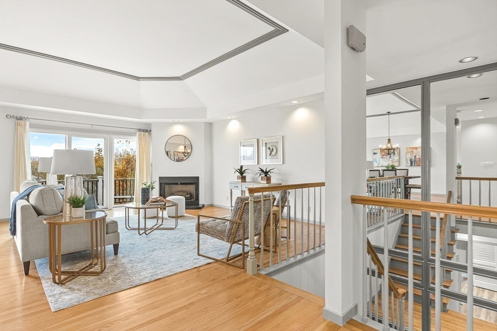 67 Algonquin Road, Unit 67 Newton, MA 02467 - Photo 6 of 38 a living room with furniture and a large window