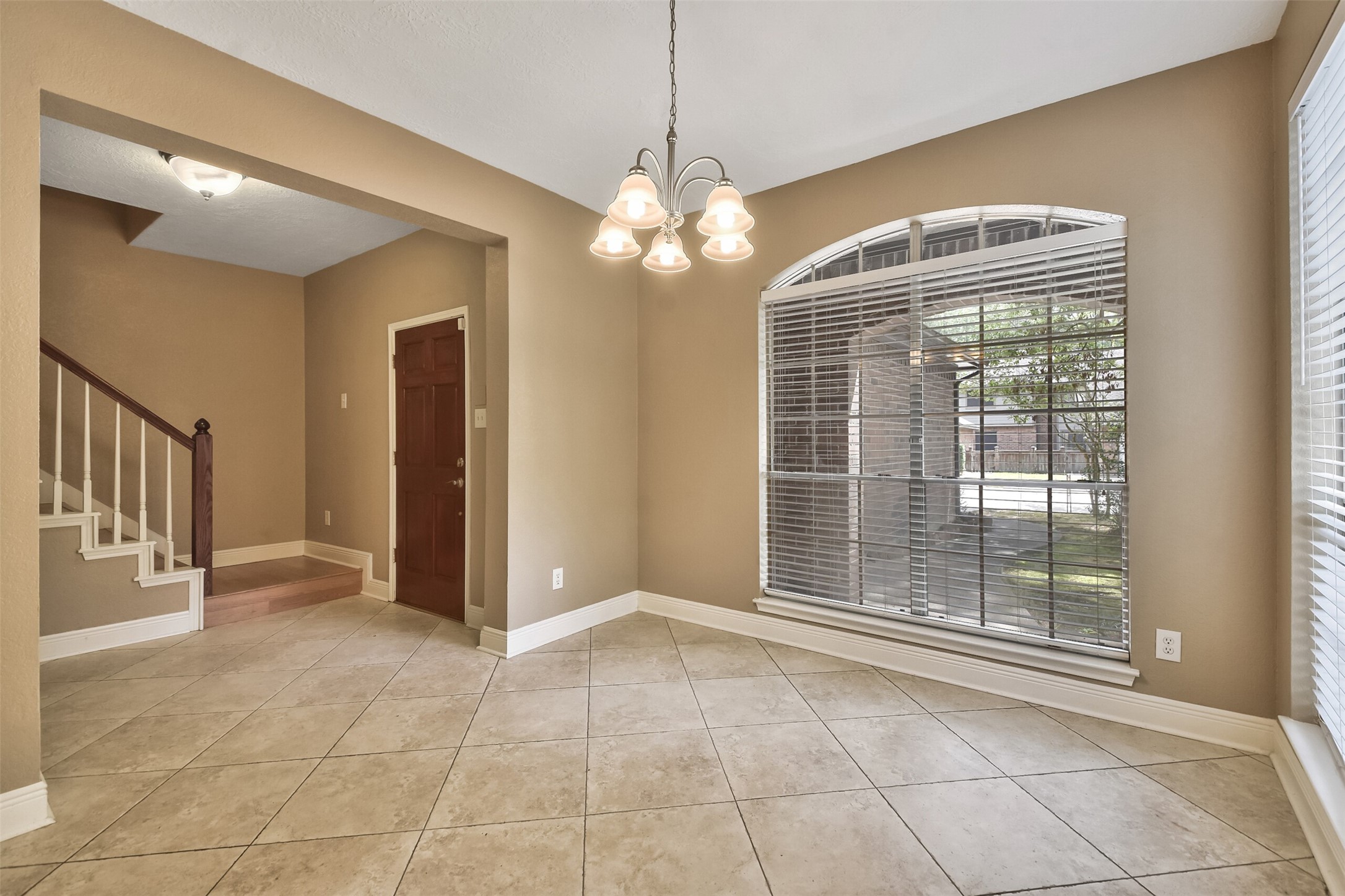 5 East Willowwood Court Spring, TX 77381 - Photo 16 of 27 a view of an empty room with a window
