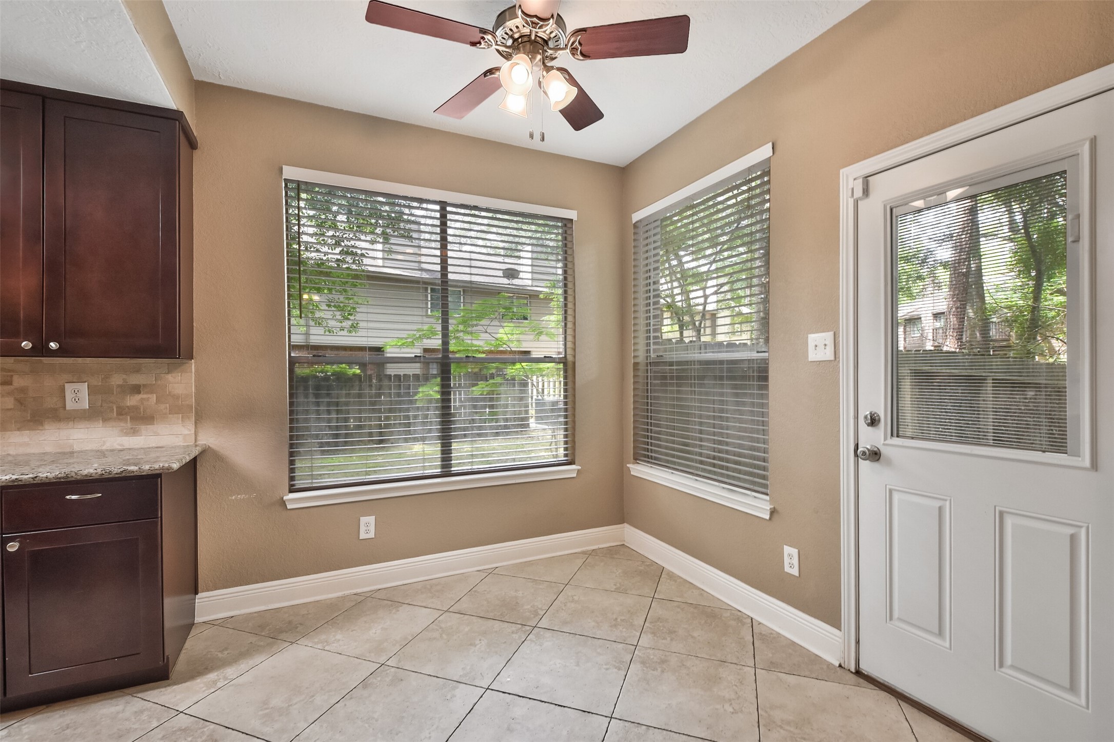 5 East Willowwood Court Spring, TX 77381 - Photo 9 of 27 a view of an empty room with a window