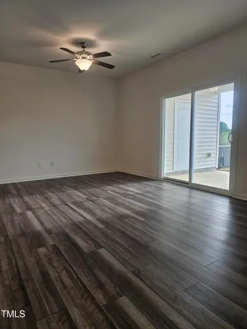 a view of a kitchen from the hallway