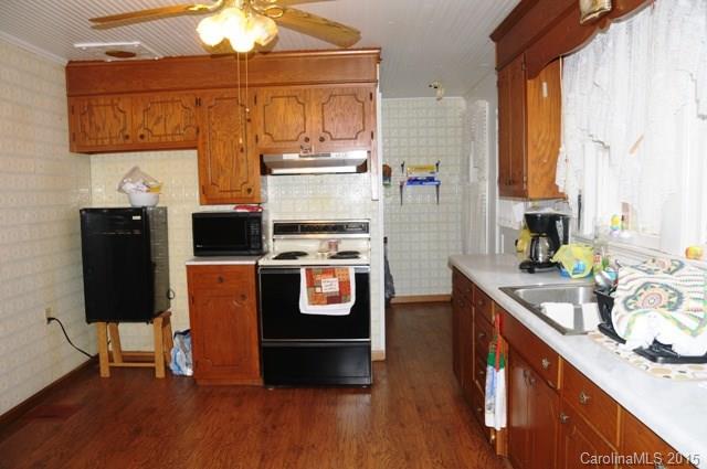 1673 Cat Square Road Vale, NC 28168 - Photo 2 of 24 a kitchen with stainless steel appliances granite countertop a sink stove and refrigerator