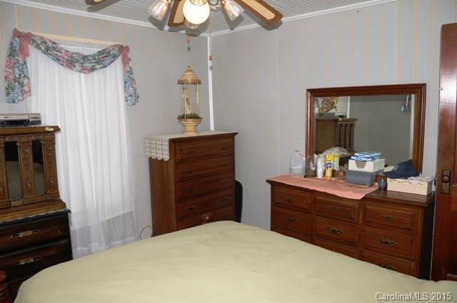 1673 Cat Square Road Vale, NC 28168 - Photo 11 of 24 a bedroom with a bed and a dresser