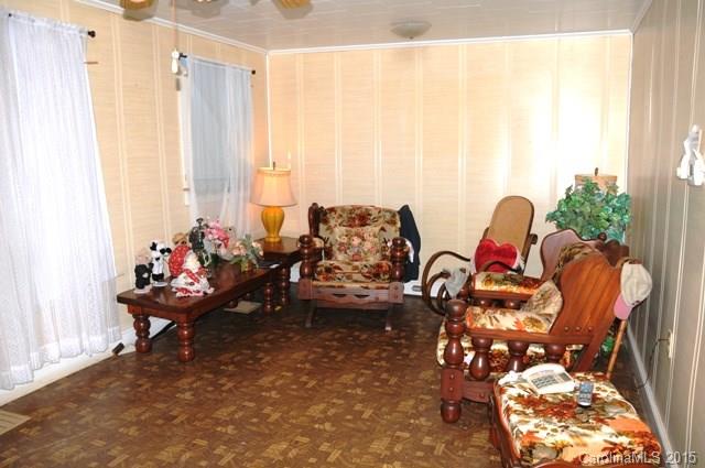 1673 Cat Square Road Vale, NC 28168 - Photo 21 of 24 a living room with furniture and floor to ceiling window