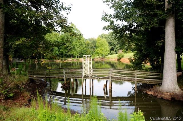 1673 Cat Square Road Vale, NC 28168 - Photo 22 of 24 a view of a lake from a bench