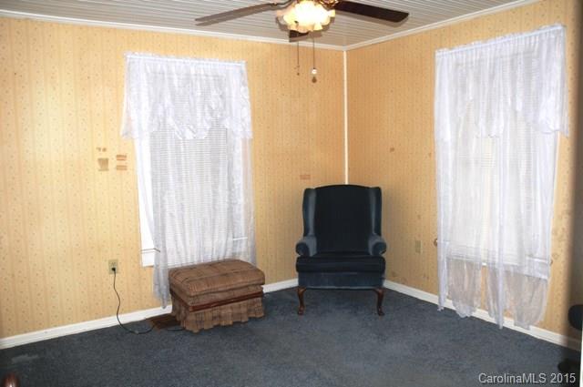 1673 Cat Square Road Vale, NC 28168 - Photo 5 of 24 a living room with furniture and a chandelier