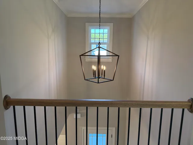 a view of a hallway with a window