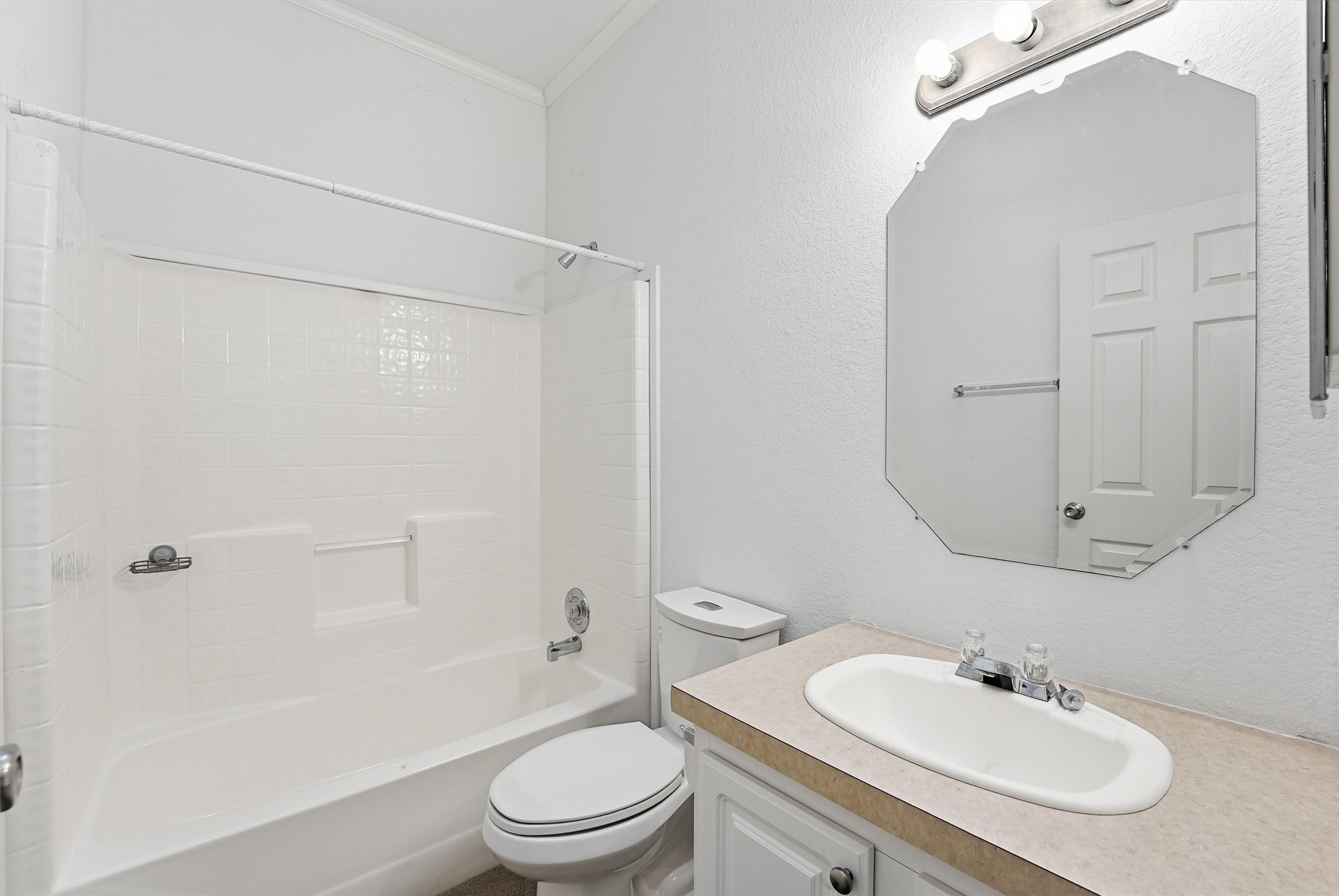 351 County Road 6501 Dayton, TX 77535 - Photo 20 of 29 a bathroom with a sink toilet and shower