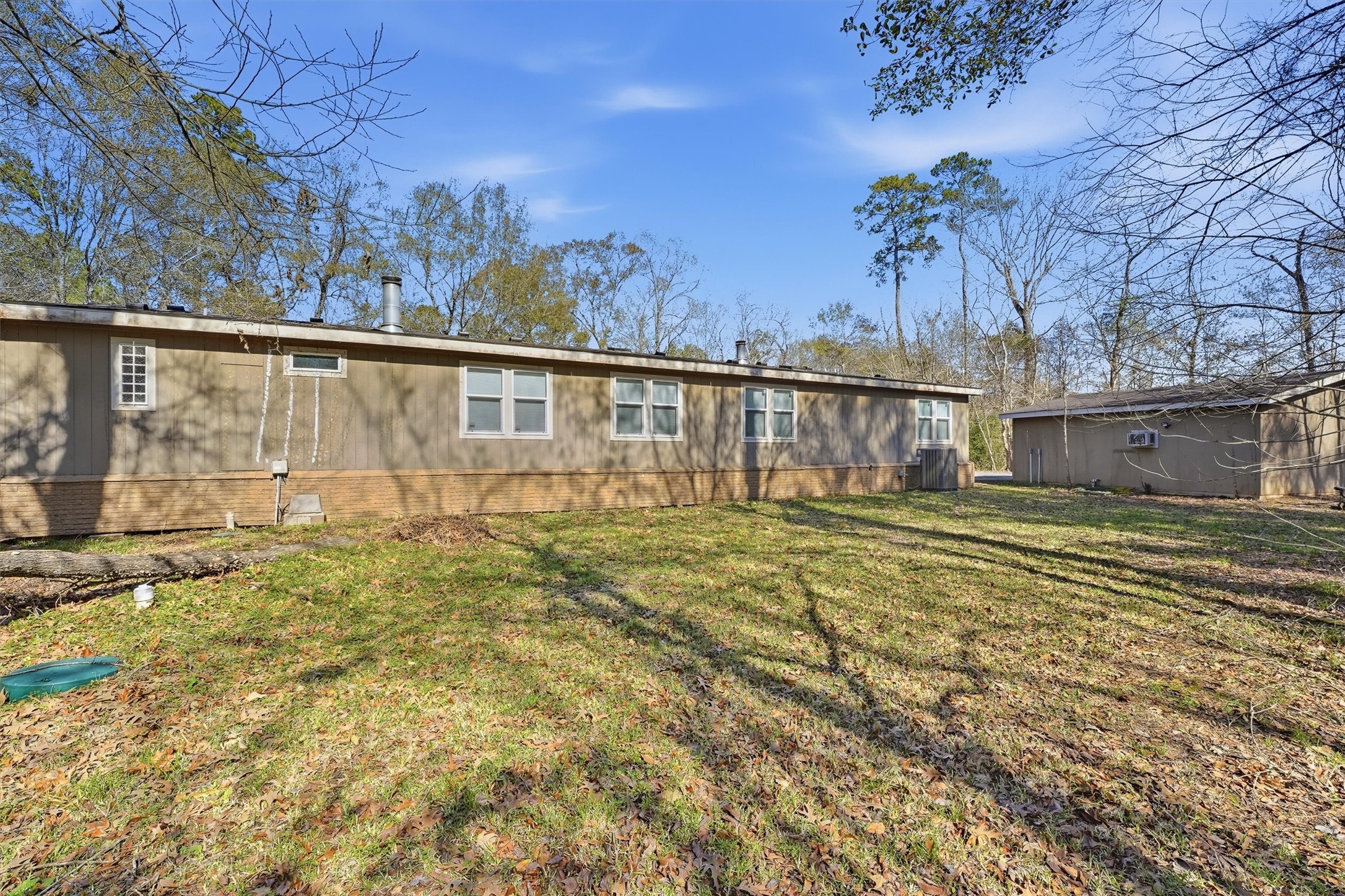 351 County Road 6501 Dayton, TX 77535 - Photo 23 of 29 a view of a backyard of the house