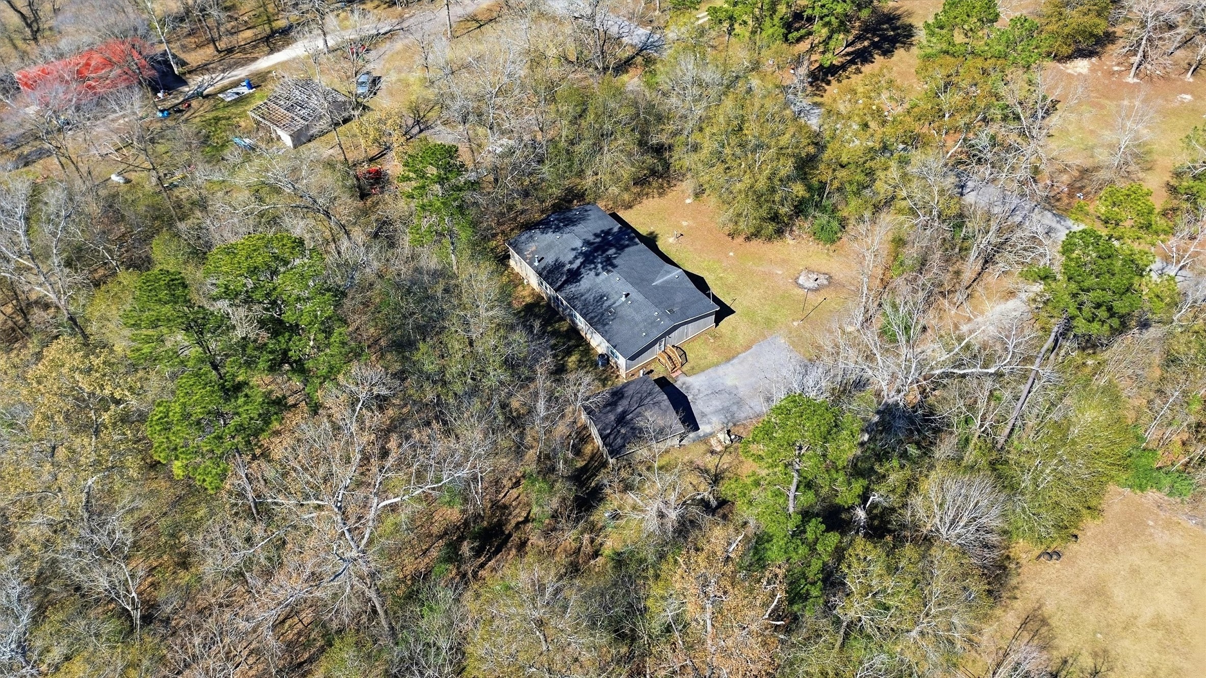 351 County Road 6501 Dayton, TX 77535 - Photo 26 of 29 a bird view of house with green space