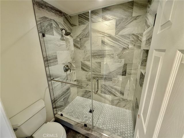 a bathroom with a sink a vanity and mirror