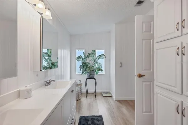 a bathroom with a sink and a bathtub