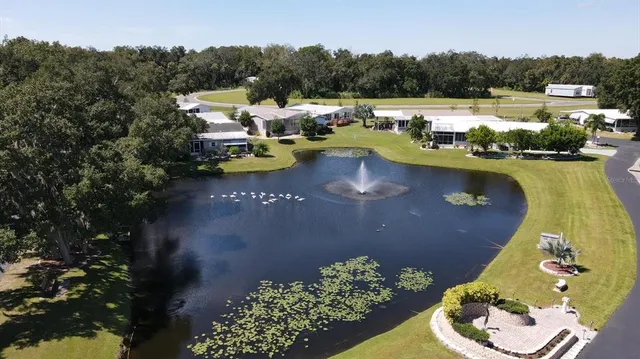 a view of a lake with a house
