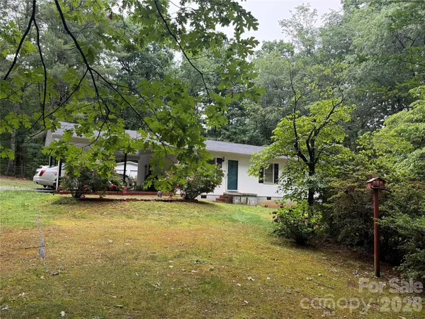a view of a house with a garden