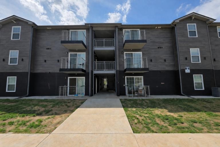 a front view of a house with glass windows