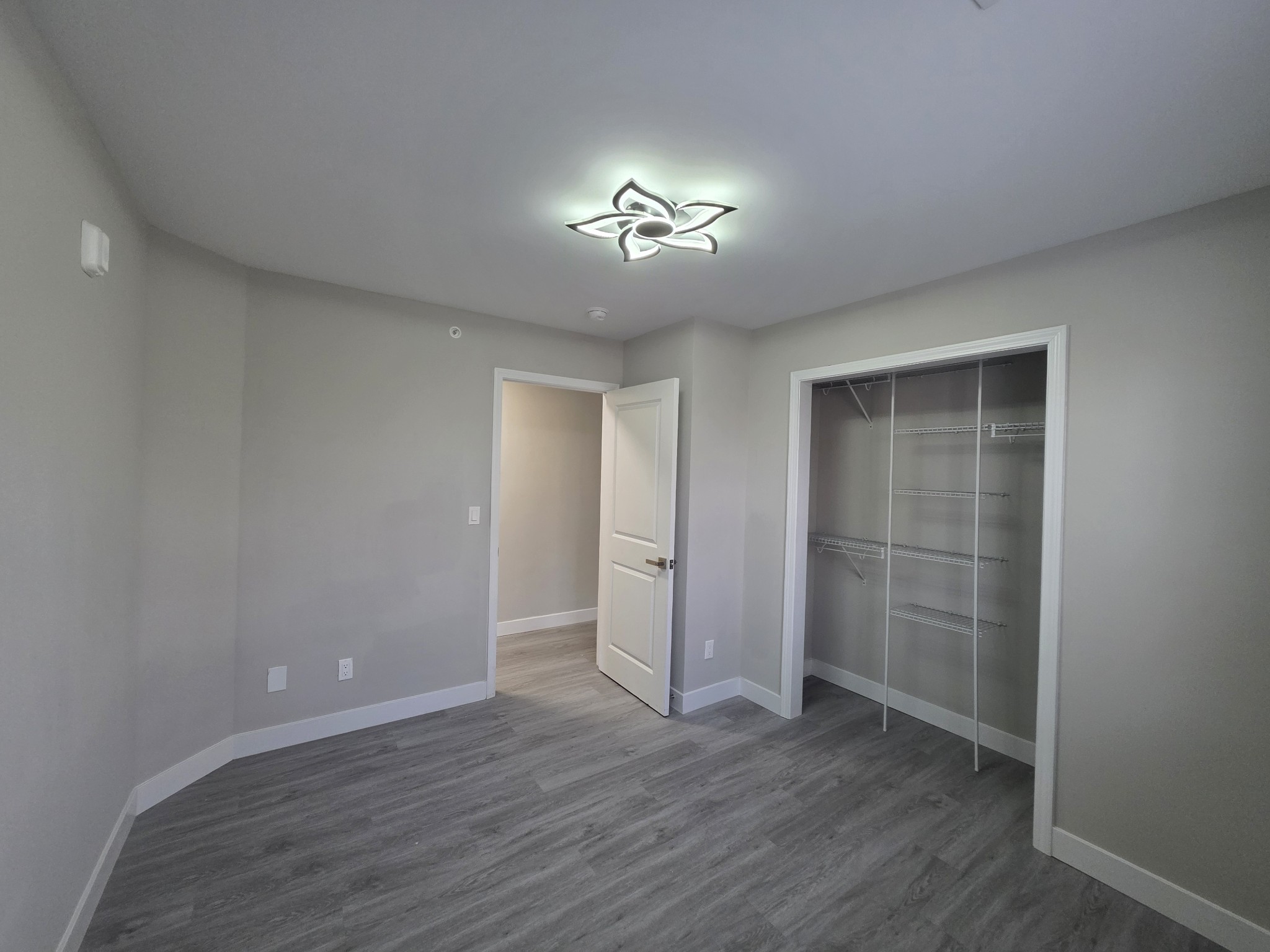 543 Peachers Mill Road Clarksville, TN 37042 - Photo 19 of 29 wooden floor in an empty room with a window
