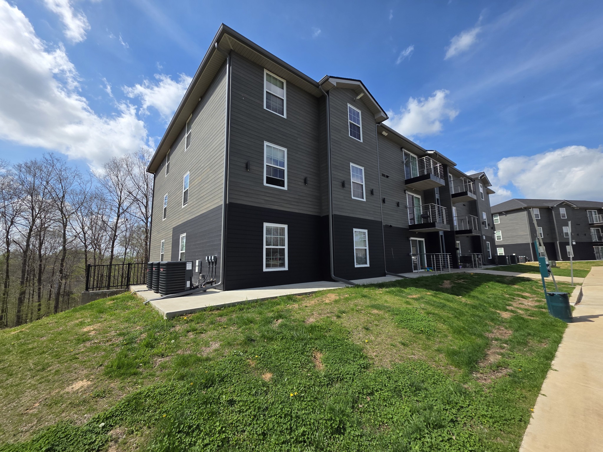 543 Peachers Mill Road Clarksville, TN 37042 - Photo 2 of 29 a front view of a house with a yard table and chairs