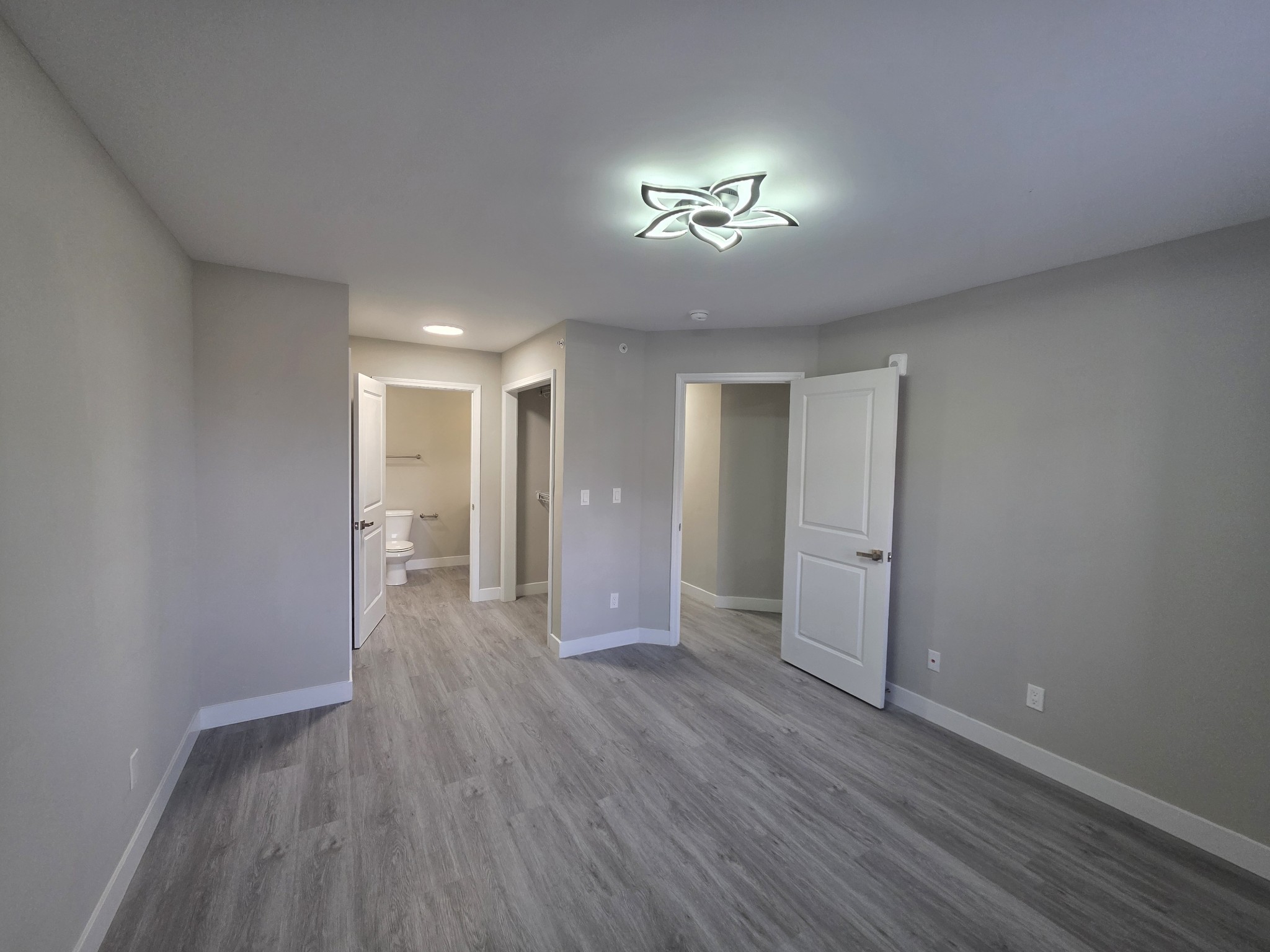 543 Peachers Mill Road Clarksville, TN 37042 - Photo 27 of 29 a view of an empty room with wooden floor