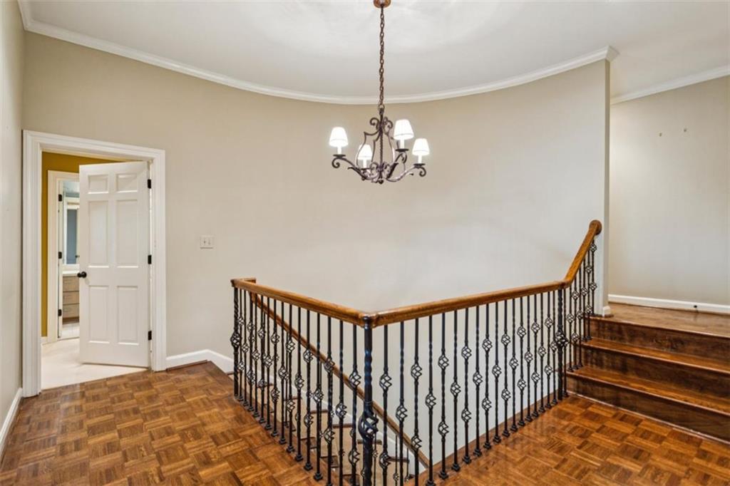 19 Mooregate Square Northwest Atlanta, GA 30327 - Photo 33 of 48 a view of a hallway view with a chandelier