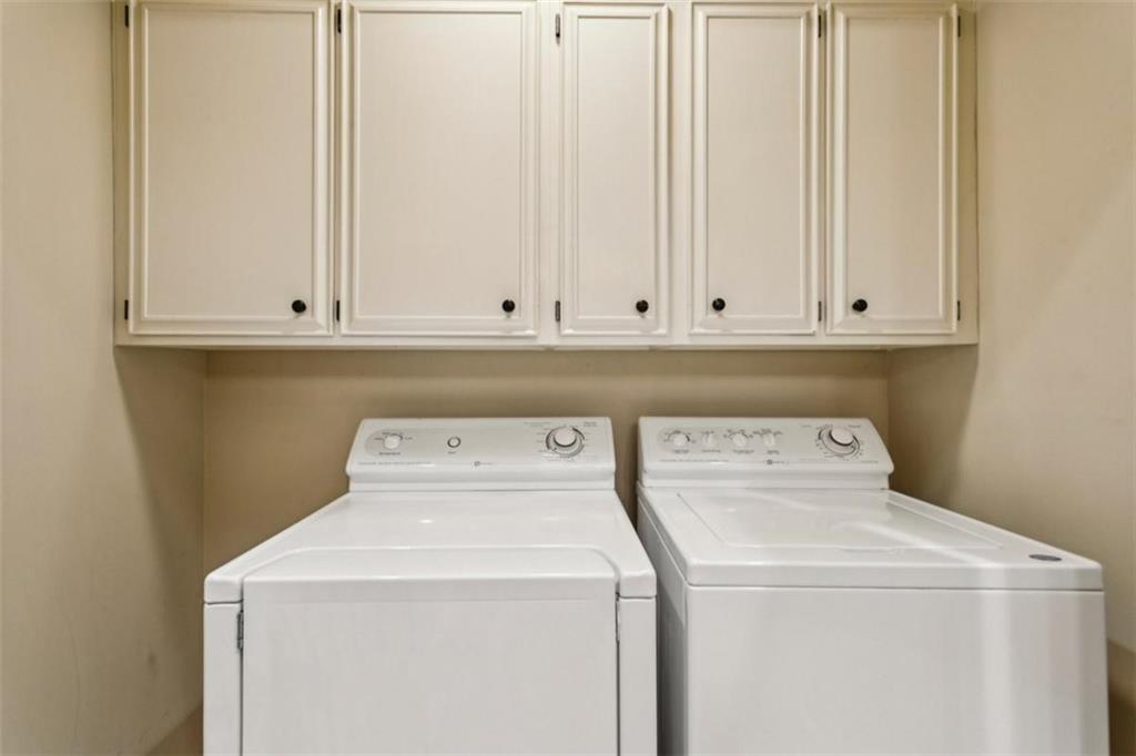 19 Mooregate Square Northwest Atlanta, GA 30327 - Photo 40 of 48 a utility room with dryer and washer