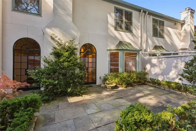 a backyard of a house with lots of green space