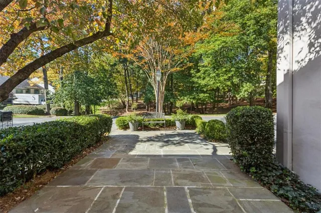 a view of a pathway with a patio
