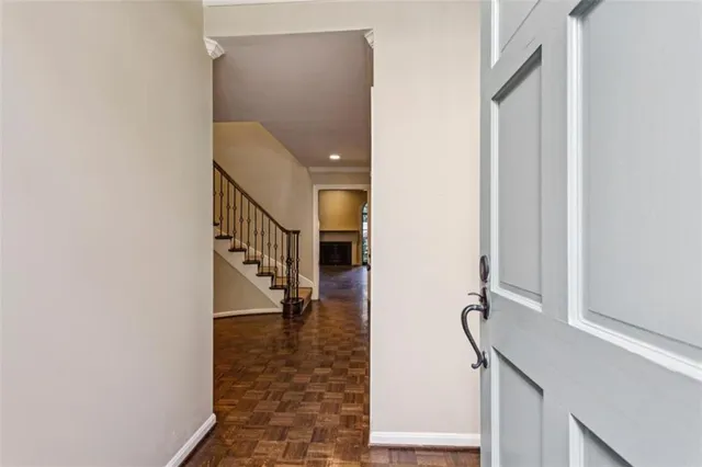 a view of a hallway with staircase