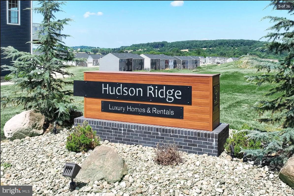 a sign on the wall of building