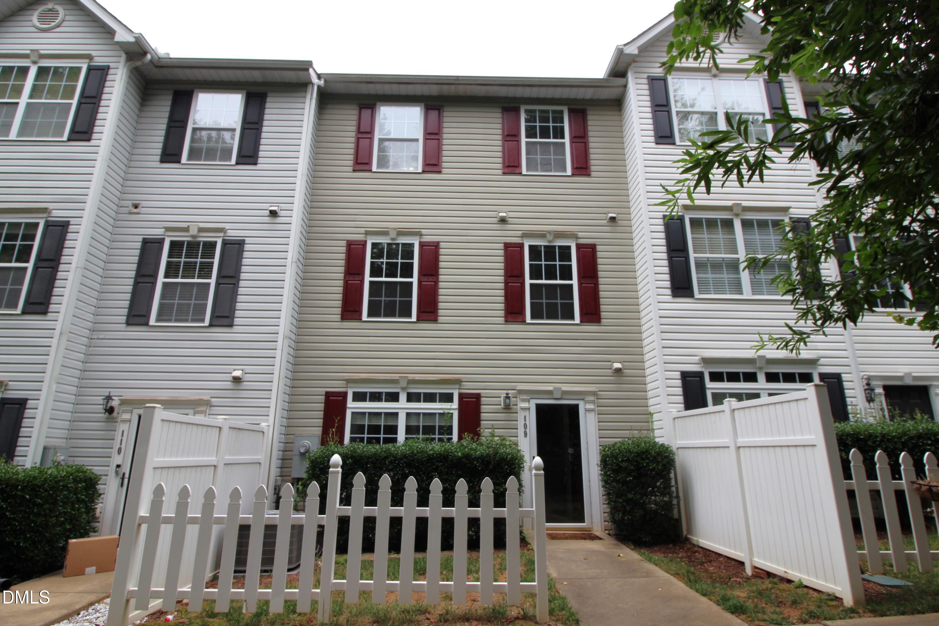 3030 Barrymore Street, Unit 109 Raleigh, NC 27603 - Photo 1 of 17 a front view of a house with a porch