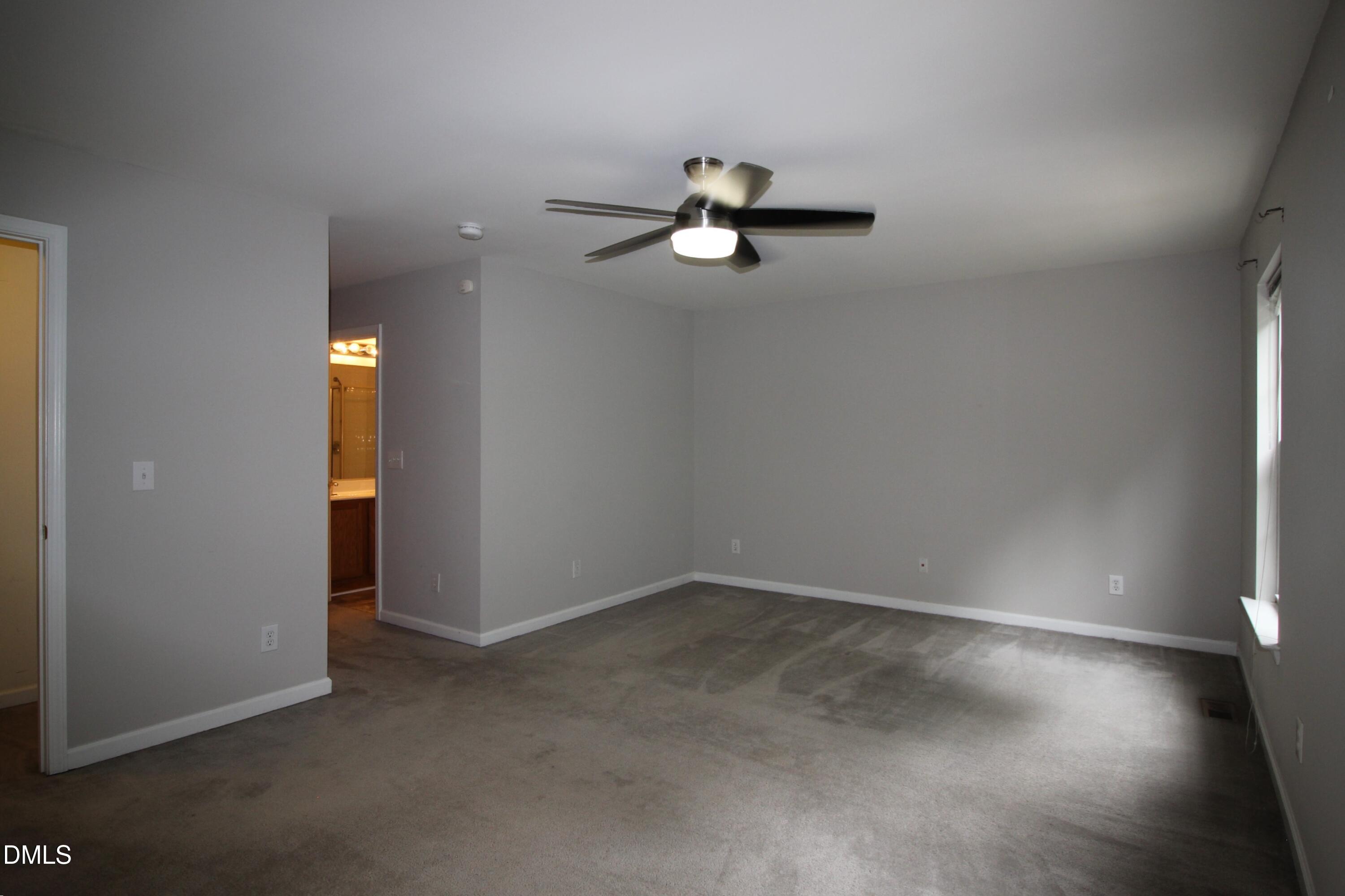 3030 Barrymore Street, Unit 109 Raleigh, NC 27603 - Photo 8 of 17 an empty room with closet