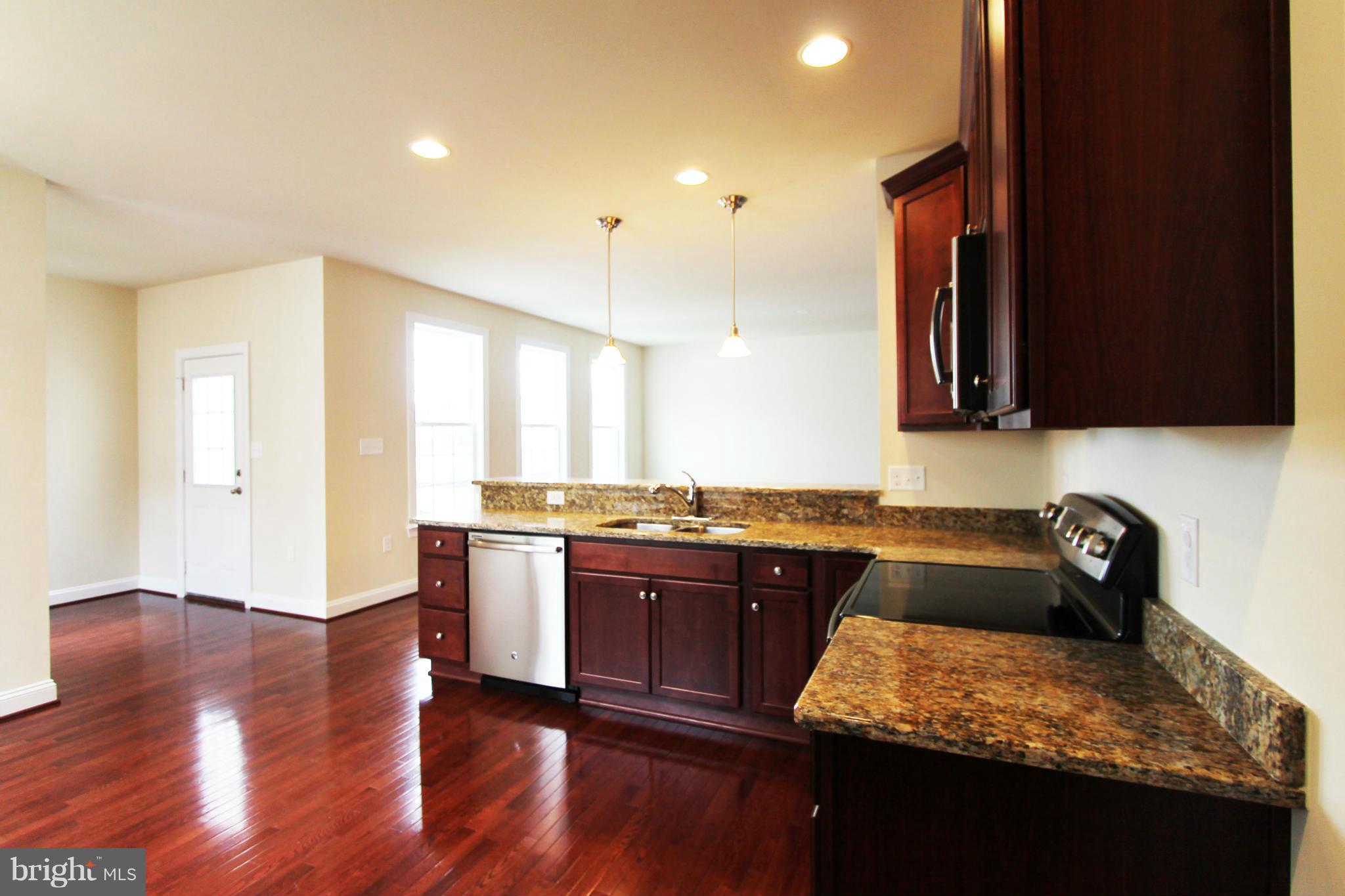0 North Fairfax Boulevard Ranson, WV 25438 - Photo 8 of 30 Kitchen to Family Room