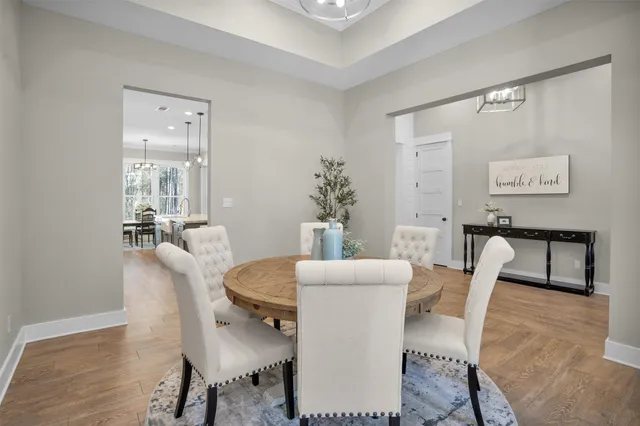 a living room with furniture fireplace and window