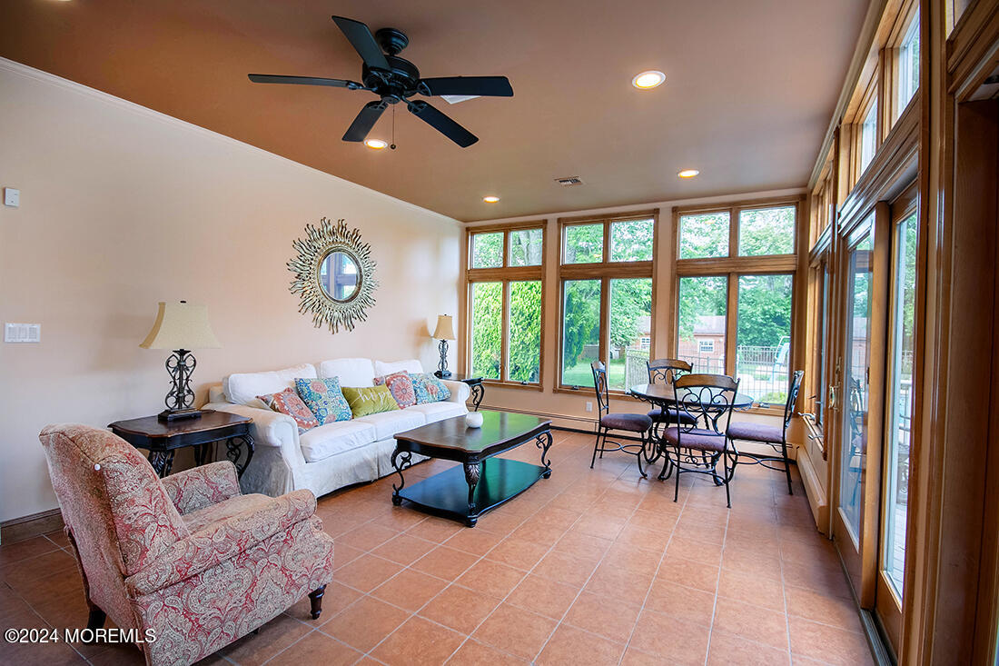 72 Vanderveer Road Freehold, NJ 07728 - Photo 26 of 53 a living room with furniture and a large window