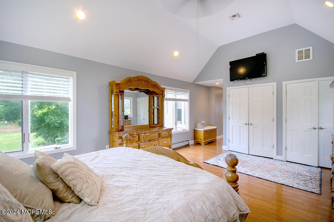 72 Vanderveer Road Freehold, NJ 07728 - Photo 35 of 53 a bedroom with a bed and wooden floor