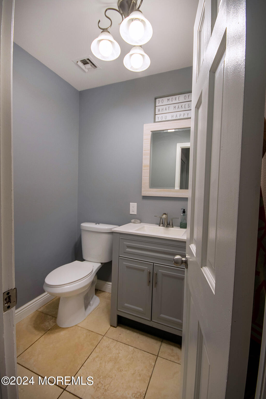 72 Vanderveer Road Freehold, NJ 07728 - Photo 52 of 53 a bathroom with a toilet sink and mirror