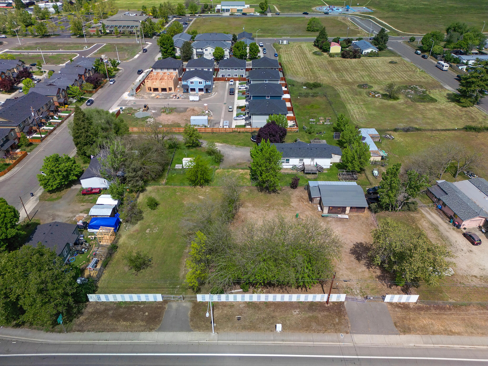 3251 Antelope Road White City, OR 97503 - Photo 7 of 9 an aerial view of residential houses with outdoor space and parking