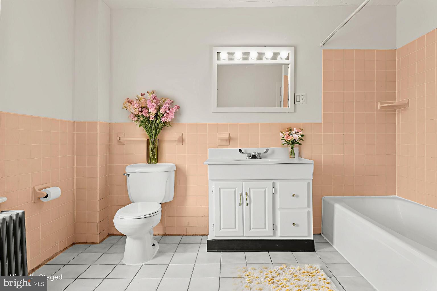 4474 Livingston Street Philadelphia, PA 19137 - Photo 19 of 27 a bathroom with a sink toilet and shower