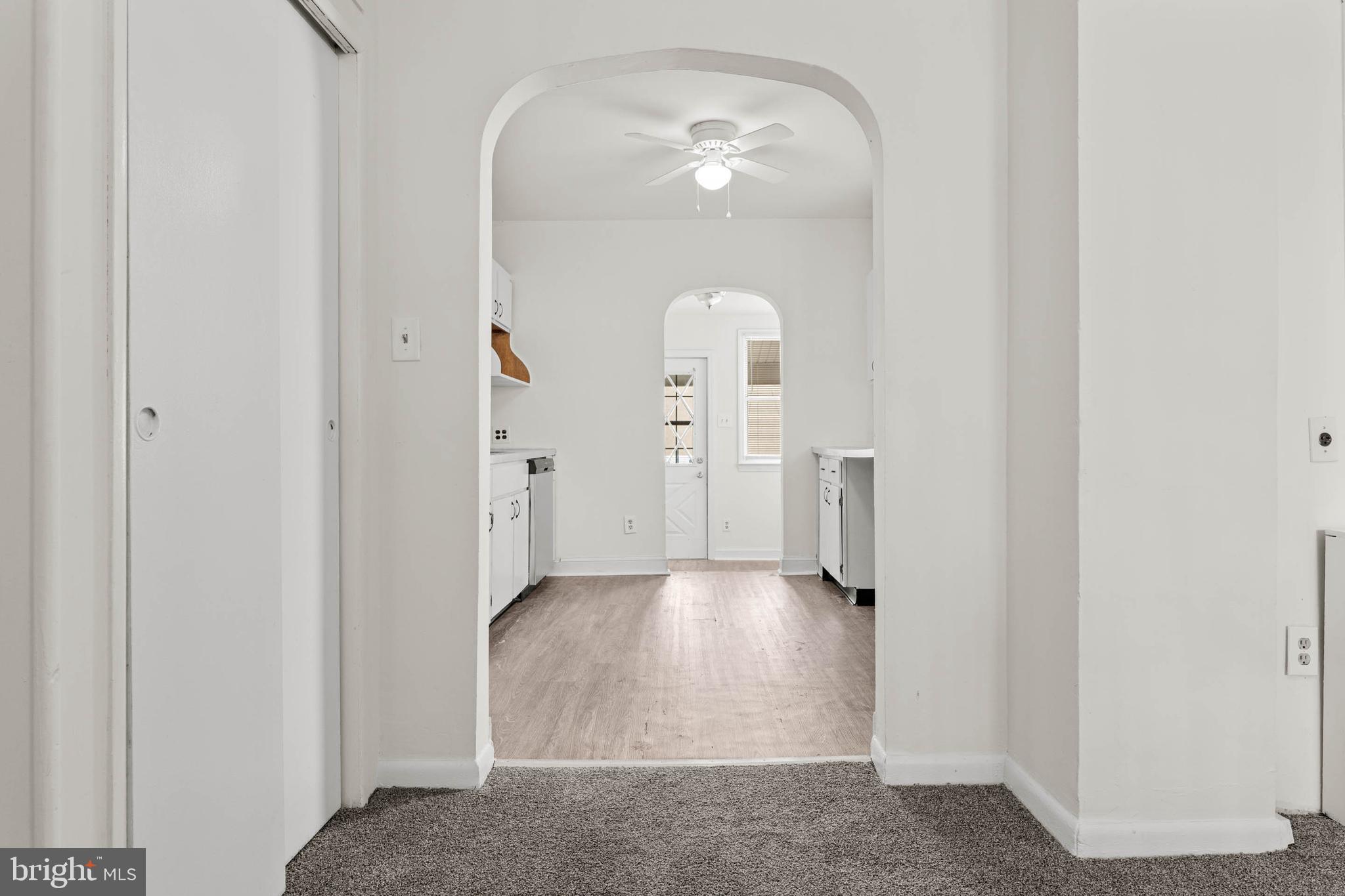 4474 Livingston Street Philadelphia, PA 19137 - Photo 7 of 27 a view of a room with wooden floor and mirror