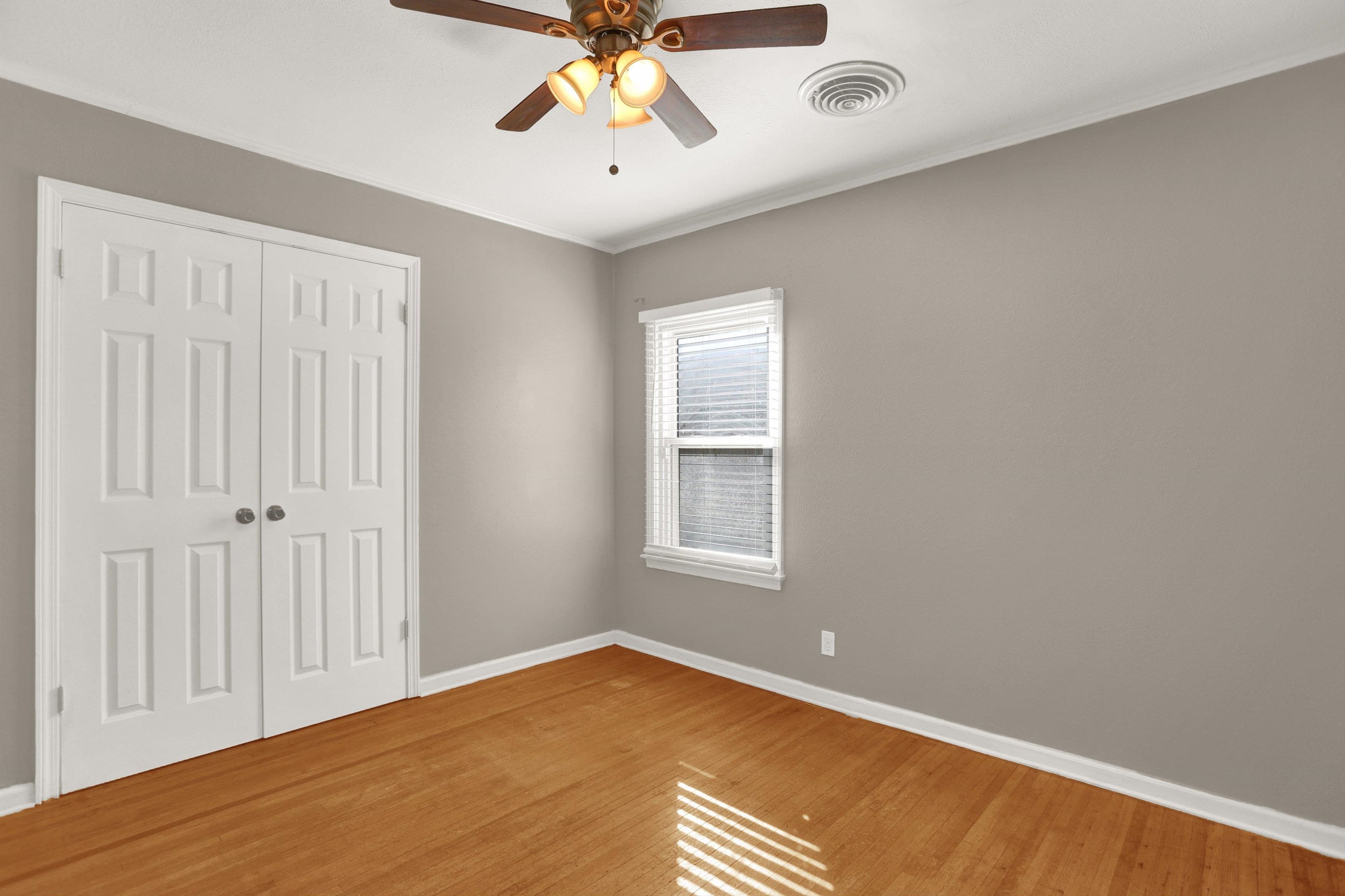 1459 Flamingo Road Memphis, TN 38117 - Photo 3 of 31 a view of an empty room with a window