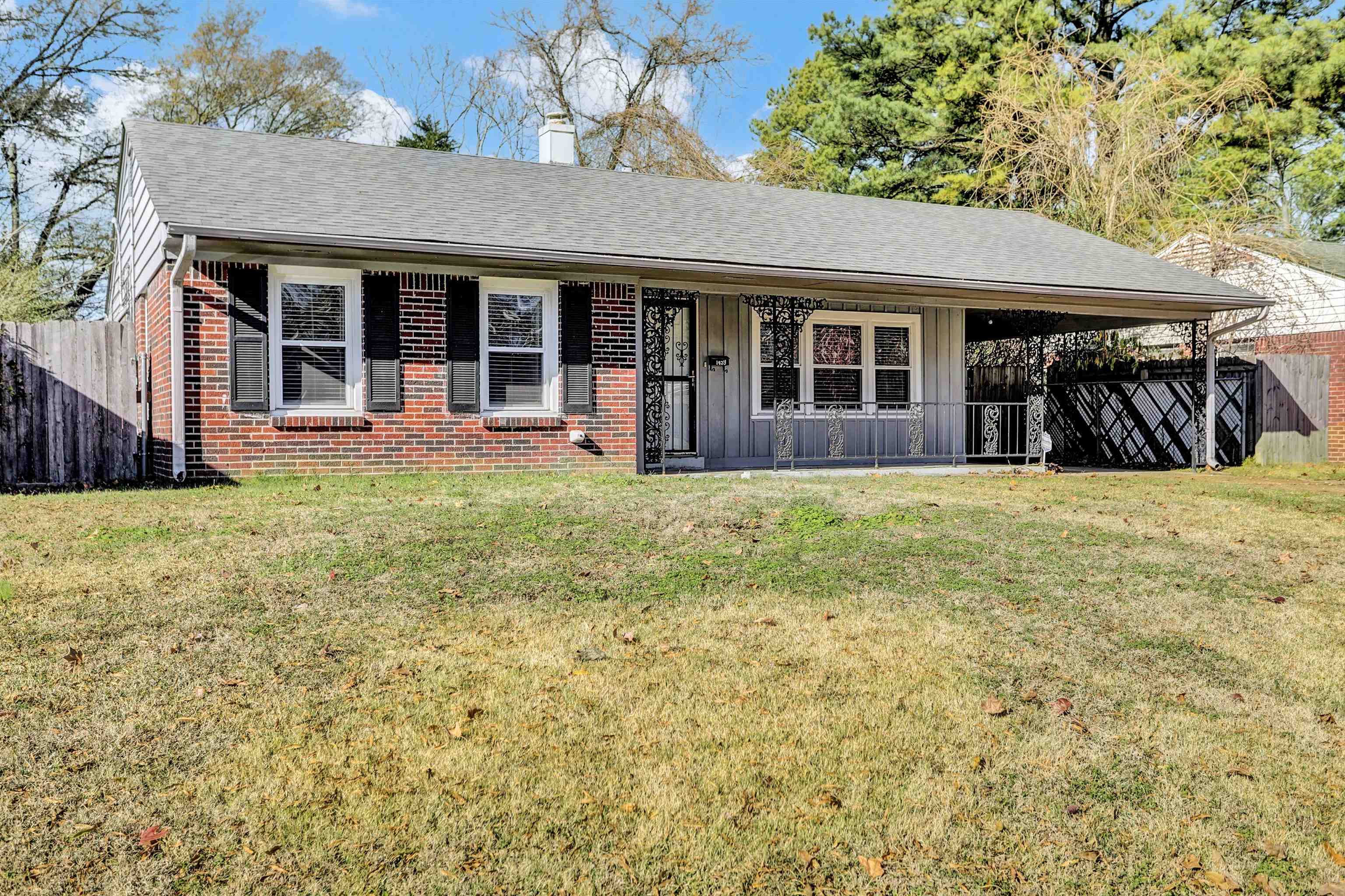 1459 Flamingo Road Memphis, TN 38117 - Photo 3 of 31 a view of a house with yard and porch