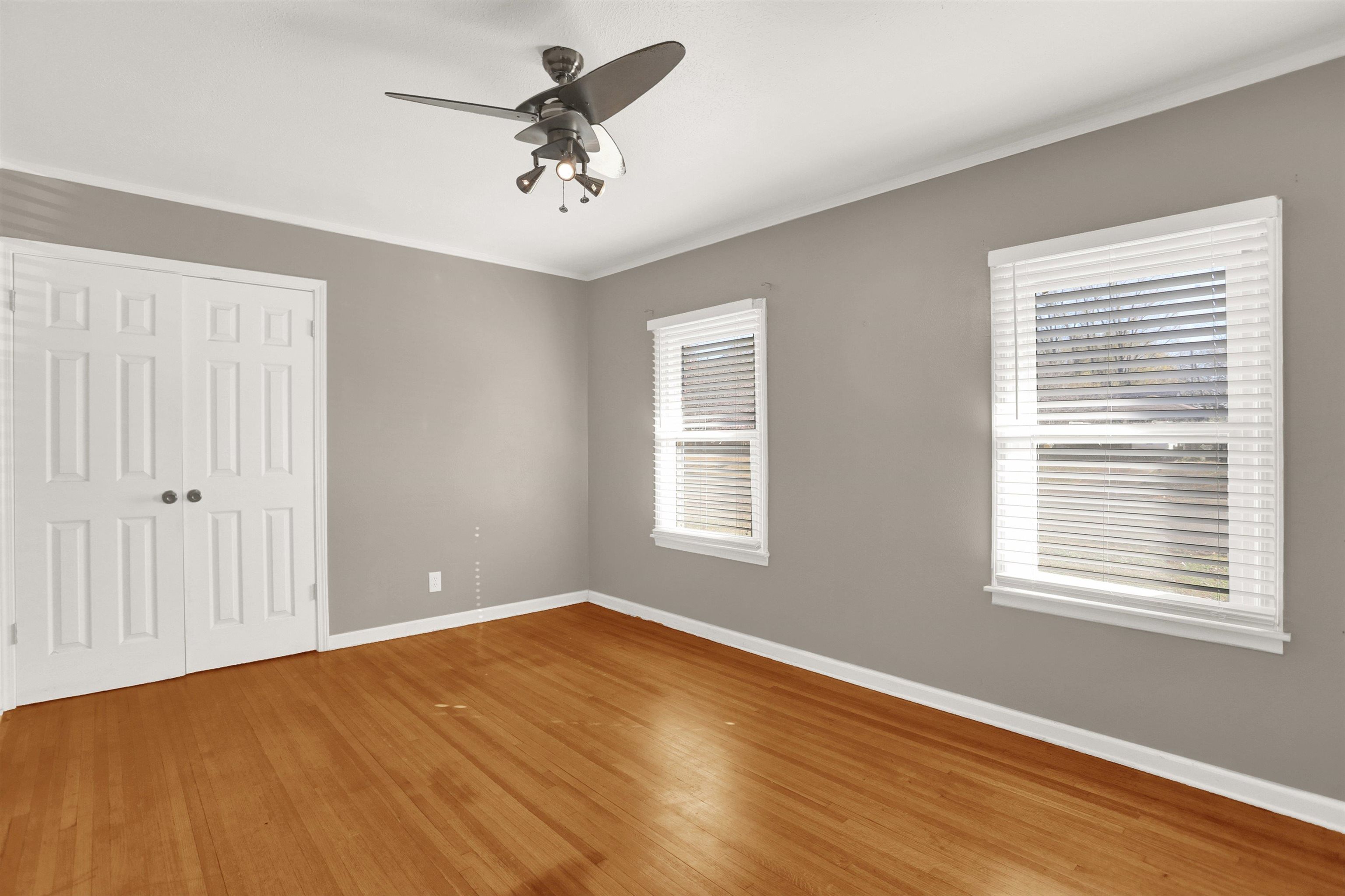 1459 Flamingo Road Memphis, TN 38117 - Photo 6 of 31 a view of empty room with wooden floor and fan