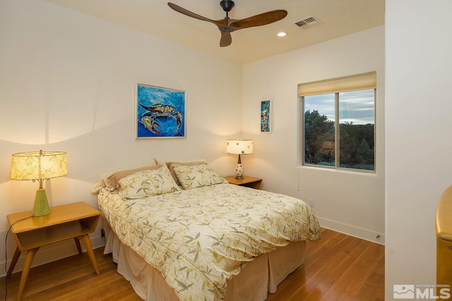 21635 Delta Drive Reno, NV 89521 - Photo 16 of 27 a bedroom with a bed and window